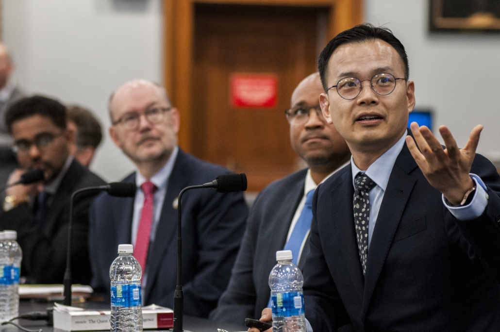 On the right side of the photo Kee-Bong Song of Samsung Semiconductor US, gestures while speaking. To Dr. Song's right are in order, Professor Jenkins, Dr Reed, and Dr. Balaprakash.